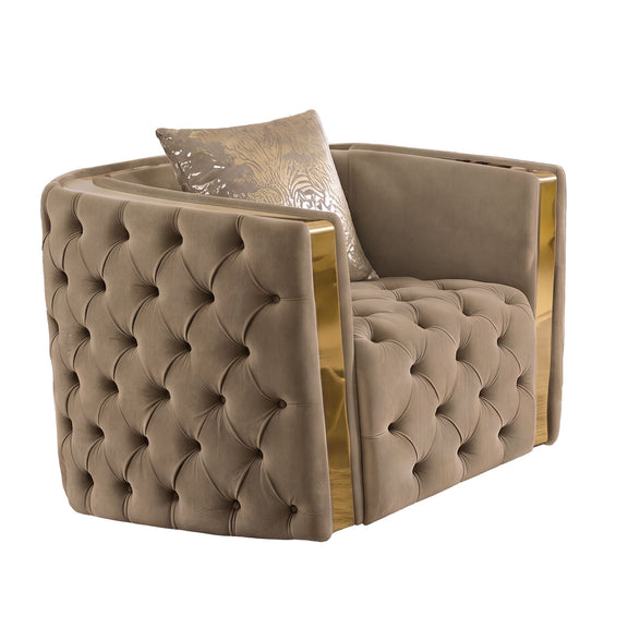 Light brown button-tufted accent chair with curved arms and gold trim around the sides