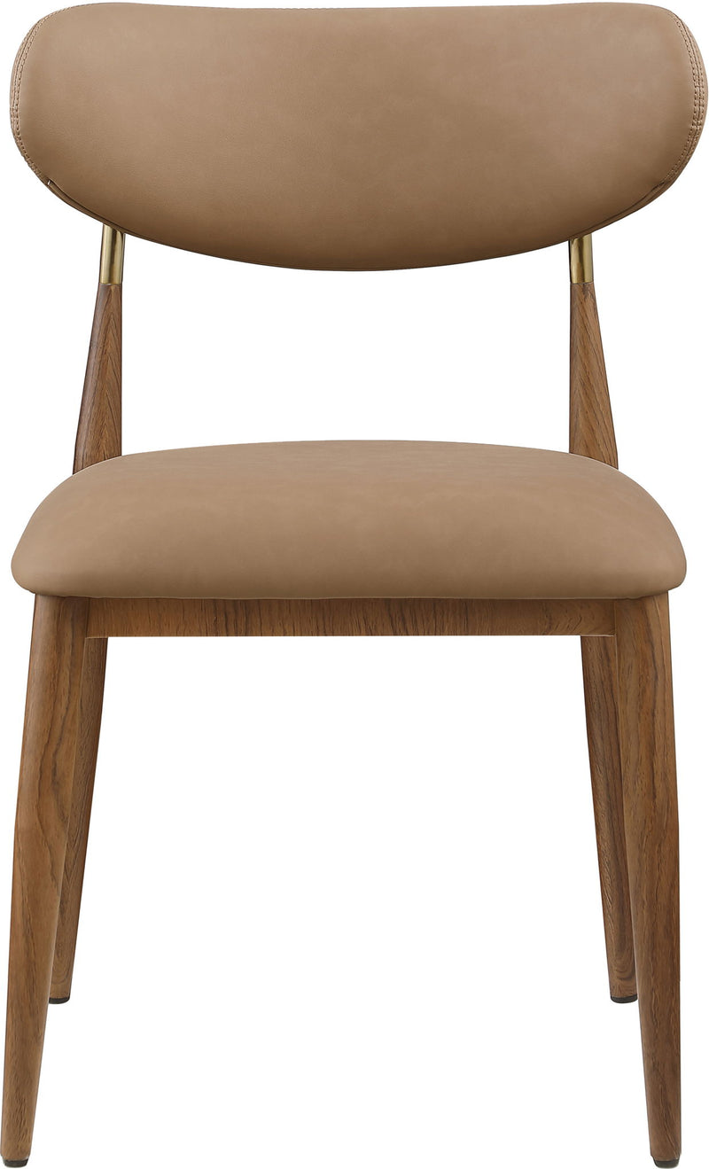 Dark brown vegan leather dining side chair, close-up view with walnut legs