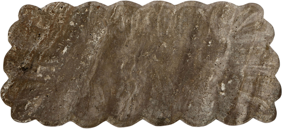 Dark gray travertine tray with scalloped border and speckled texture