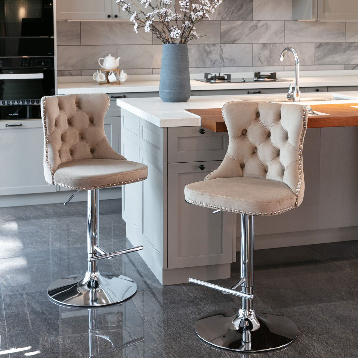 Beige tufted barstool with back, padded seat, chrome swivel base