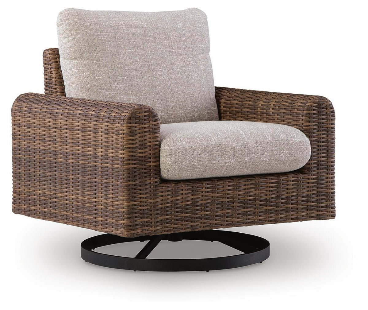Swivel lounge chair with gray cushion, brown woven wicker frame, black round base