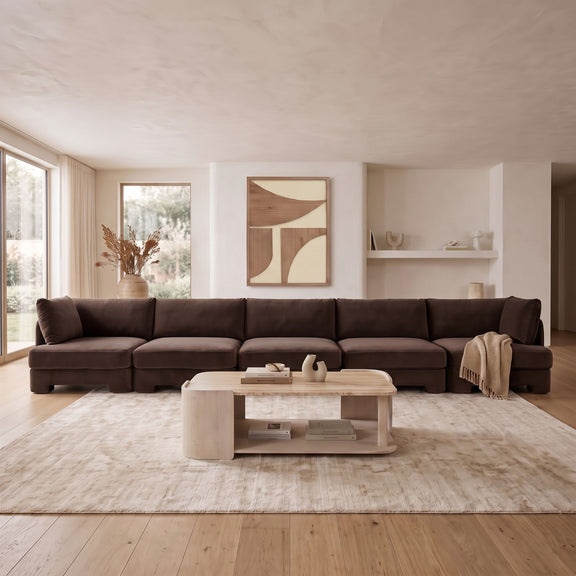 Dark brown velvet upholstered sectional sofa with deep seat and back cushions