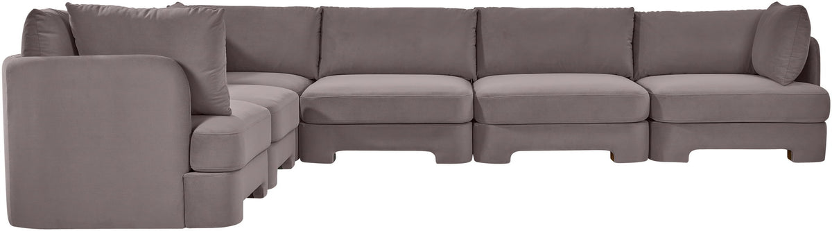 Gray velvet corner sectional sofa with modular corner layout and padded arm panels
