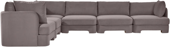 Gray velvet corner sectional sofa with modular corner layout and padded arm panels