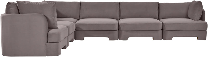 Gray velvet corner sectional sofa with modular corner layout and padded arm panels