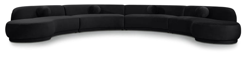 Black velvet sectional sofa with curved seat and padded arms