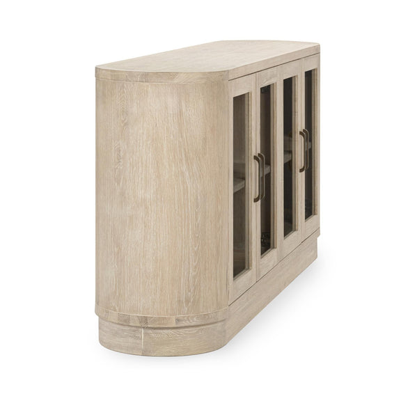 Cream washed buffet cabinet side view with glass doors and metal handle bars