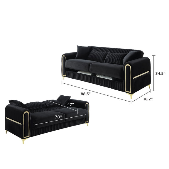 Sofa in black with ribbed back and gold-trim accents, shown with size measurements