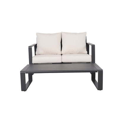 Outdoor sofa and rectangular coffee table set with light beige cushions and dark frame