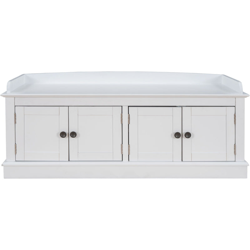 White storage bench with four paneled doors and a raised back edge