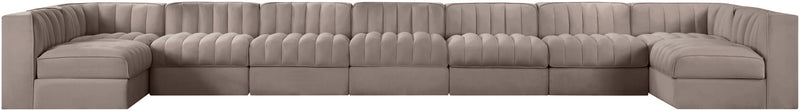 Beige armless velvet modular sectional with deep tufted back cushions and wide arms