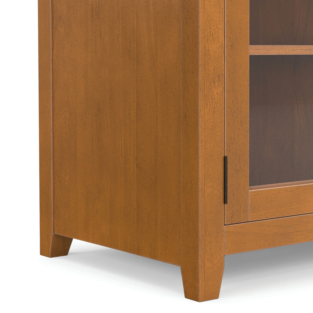 Light brown cabinet side panel with vertical grain and metal handle