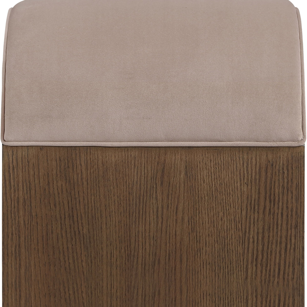 Beige velvet upholstered bench cushion with dark wood base and rounded edges