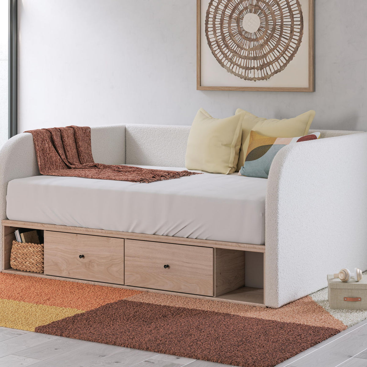 Beige upholstered day bed with two under-bed drawers and seat cushion