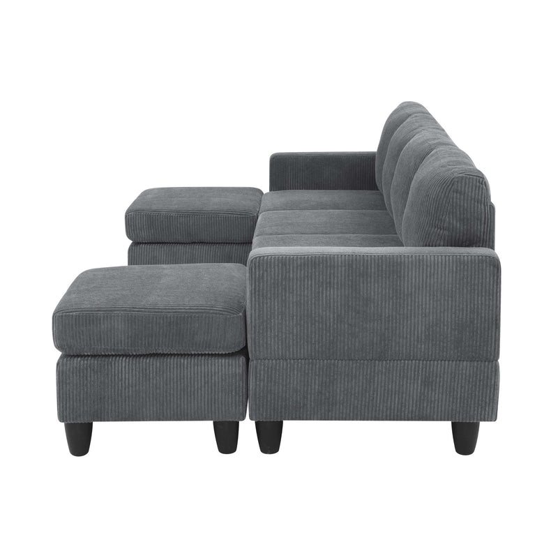 Dark gray sectional sofa with two ottomans and thick padded seat and back cushions