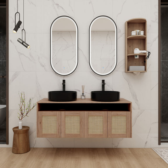 Bathroom vanity with two black vessel sinks, rattan cabinet doors, and corner wall storage shelf.