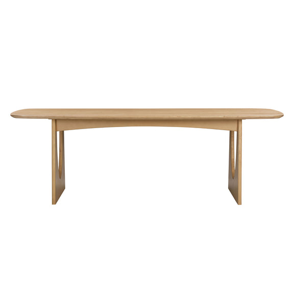 Light brown dining table with rounded ends, smooth top, and straight legs