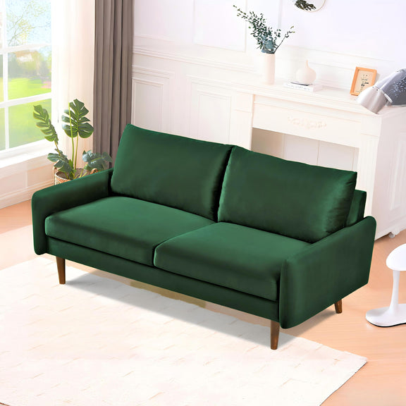 Kent sofa in dark green with two back pillows, low profile, and tapered wooden legs