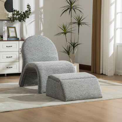 Gray upholstered armless accent chair with storage ottoman, curved back and rounded arms