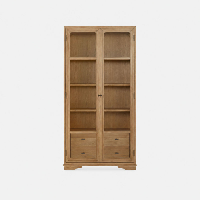 Light brown display cabinet with two glass doors, four shelves, and four drawers