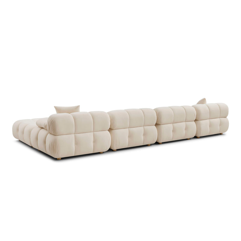 Cream modular sectional sofa with rounded seat blocks and a tall back corner
