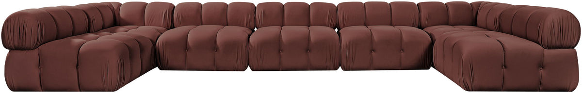 Dark red modular U-shaped sectional sofa with tufted cushions and curved chaise sections