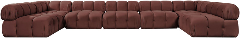 Dark red modular U-shaped sectional sofa with tufted cushions and curved chaise sections