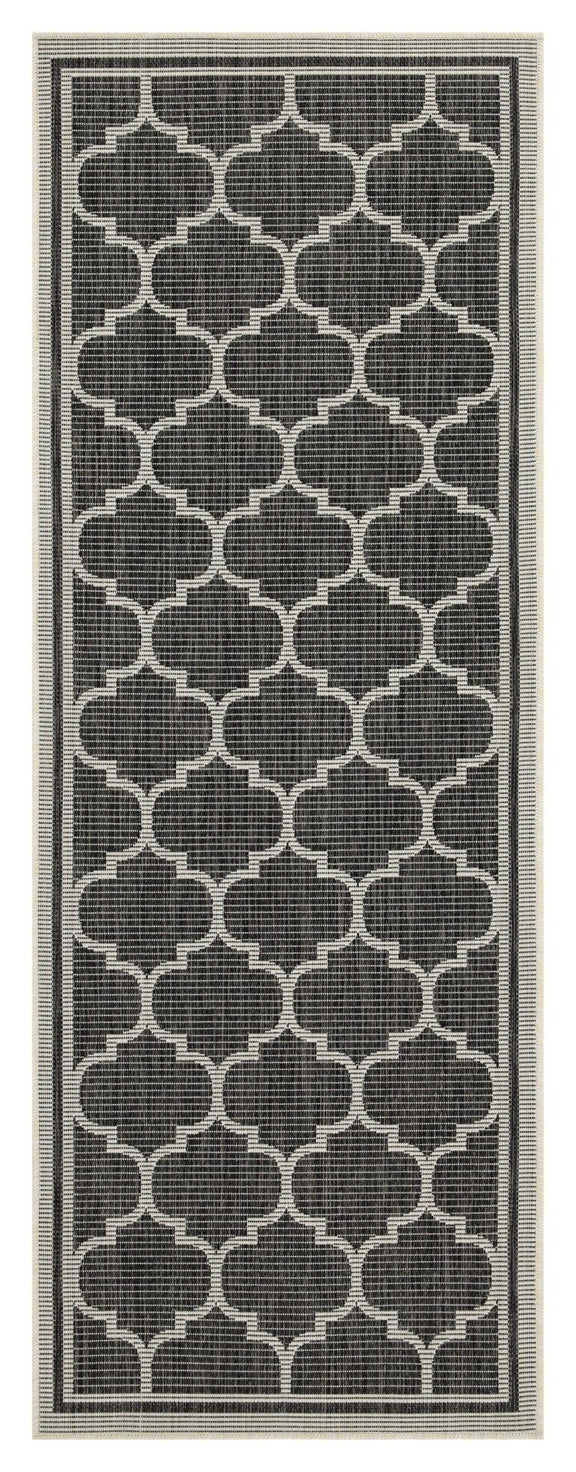 Dark charcoal polypropylene area rug with repeating quatrefoil pattern and thin border