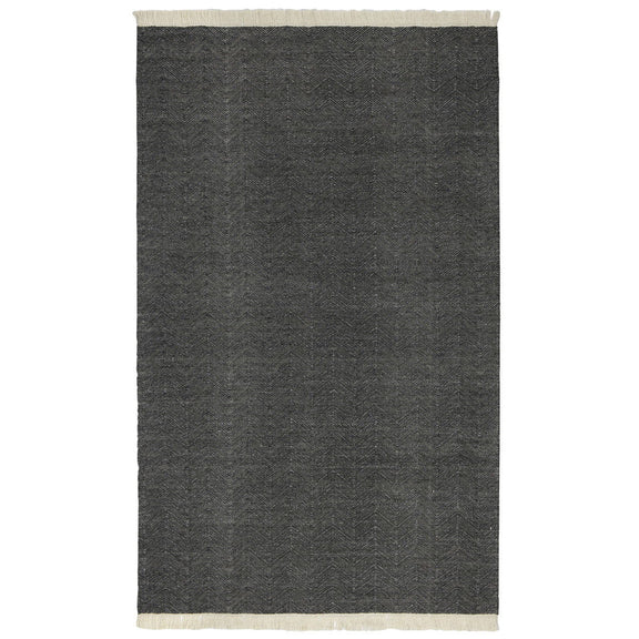 Augusta indoor/outdoor rug in charcoal dark gray with subtle chevron pattern and fringe