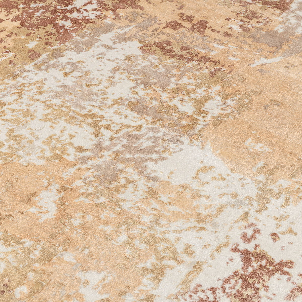 Beige area rug with distressed abstract pattern and subtle tan and rust tones.