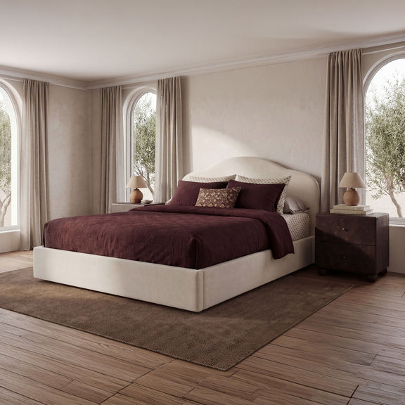Cream queen storage bed with arched headboard and upholstered platform base