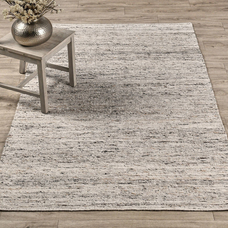 Rectangular natural beige area rug with textured weave and horizontal stripe pattern.