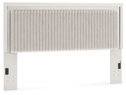 Upholstered panel headboard with white ribbed fabric and light frame, wide vertical panel