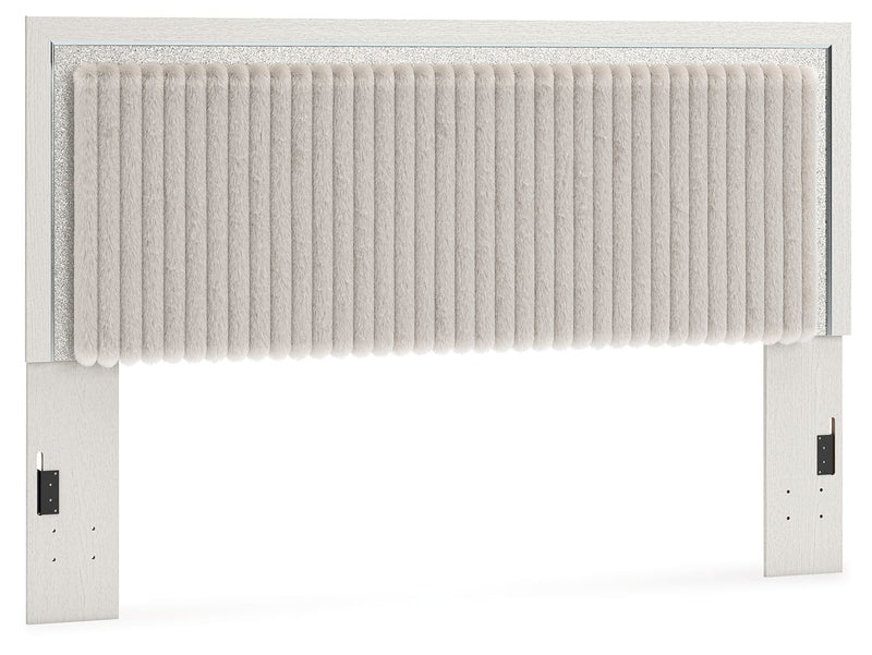 Upholstered panel headboard with white ribbed fabric and light frame, wide vertical panel