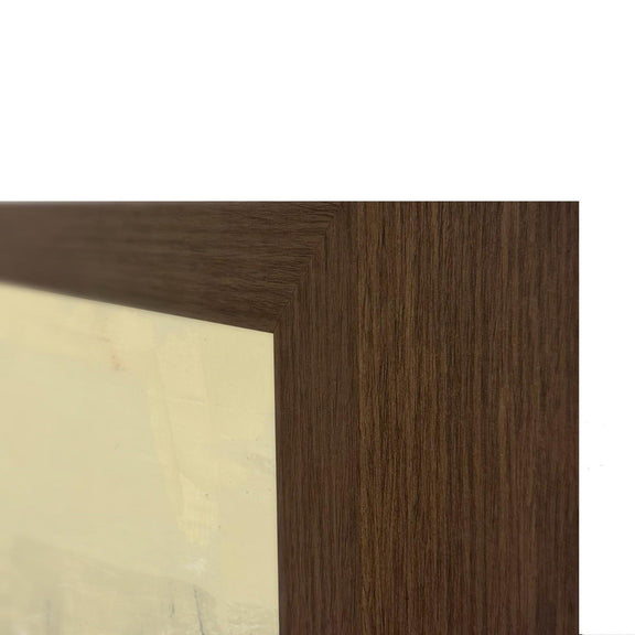 Wood frame corner of beige abstract painting with visible dark brown wood grain