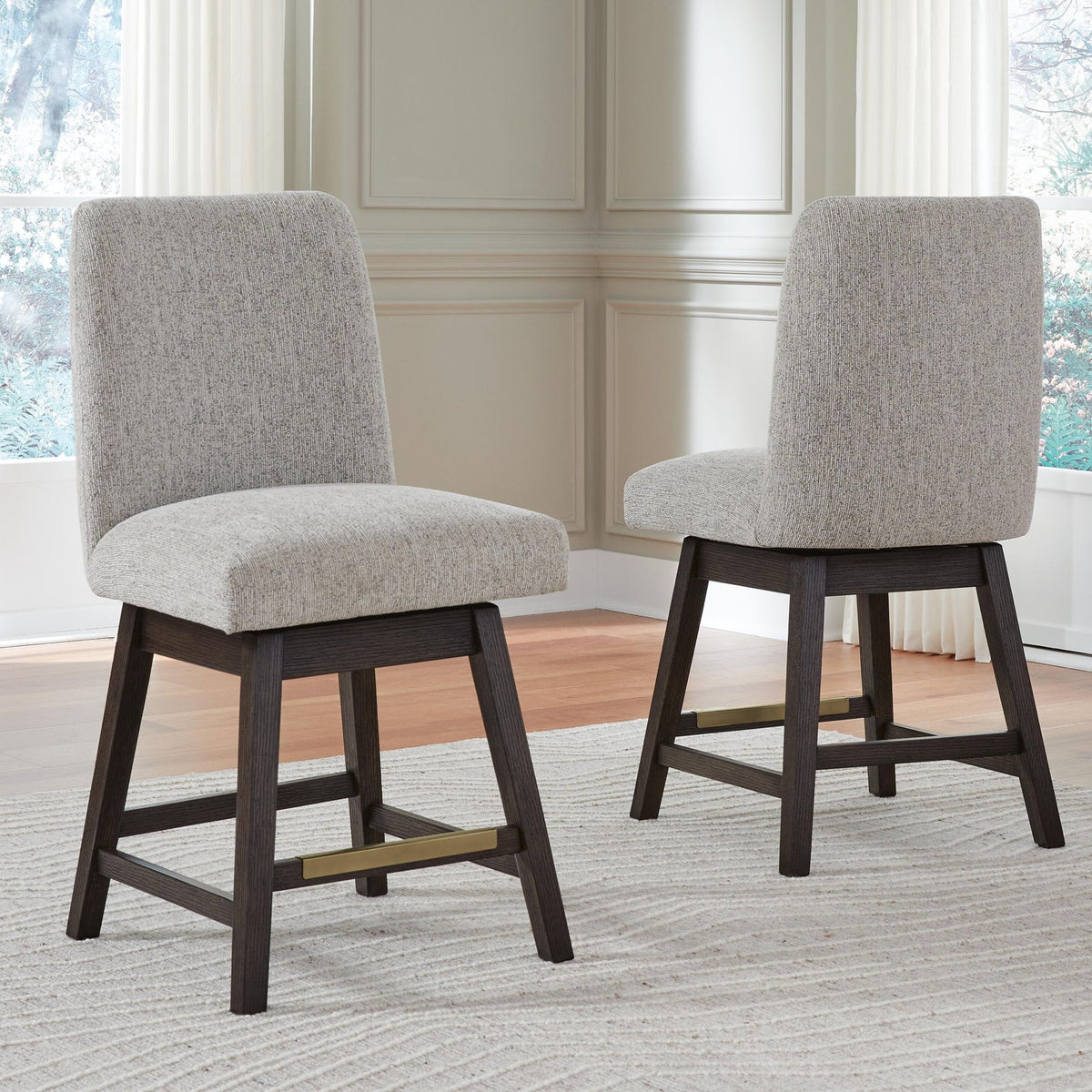 Set of 2 beige upholstered barstools with dark brown frames and tall curved backrests