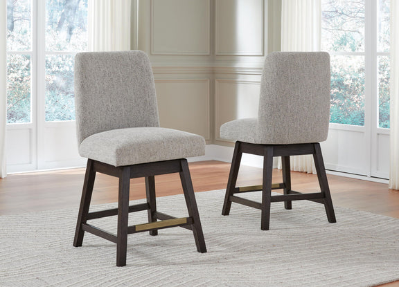 Set of 2 beige upholstered barstools with dark brown frames and tall curved backrests