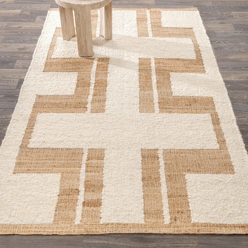 Natural and tan checkered geometric area rug with cross-style center pattern