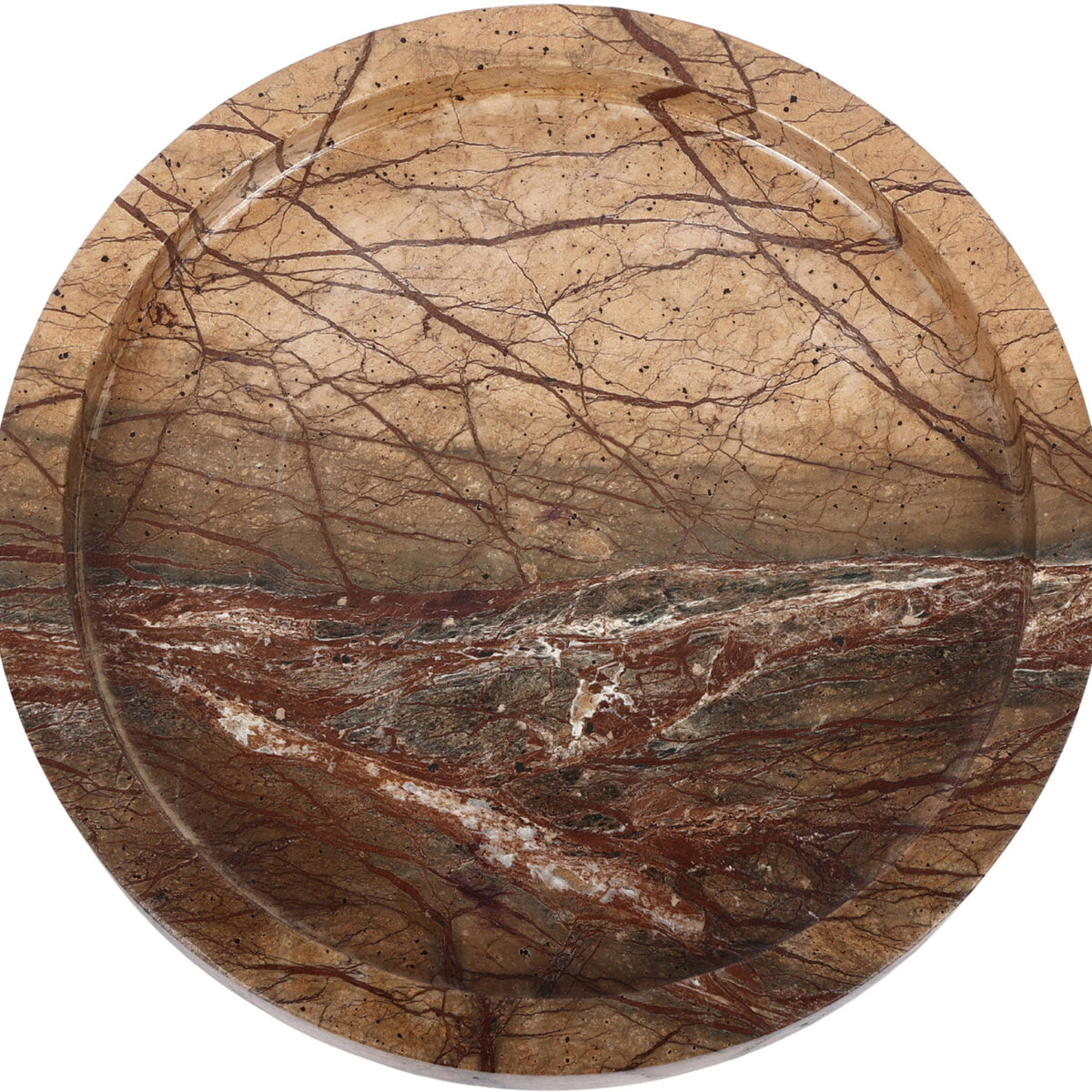 Tan marble tray with round shallow basin and red-brown and dark vein streaks