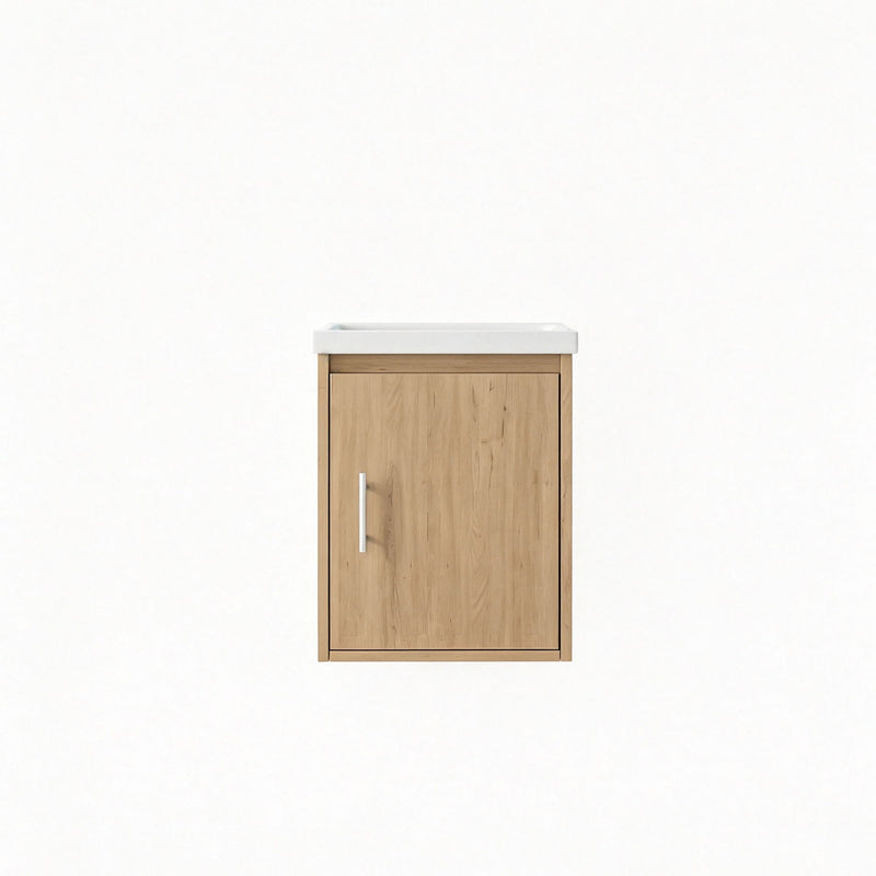 Wall-mounted bathroom vanity cabinet with sink, light brown wood door and metal handle