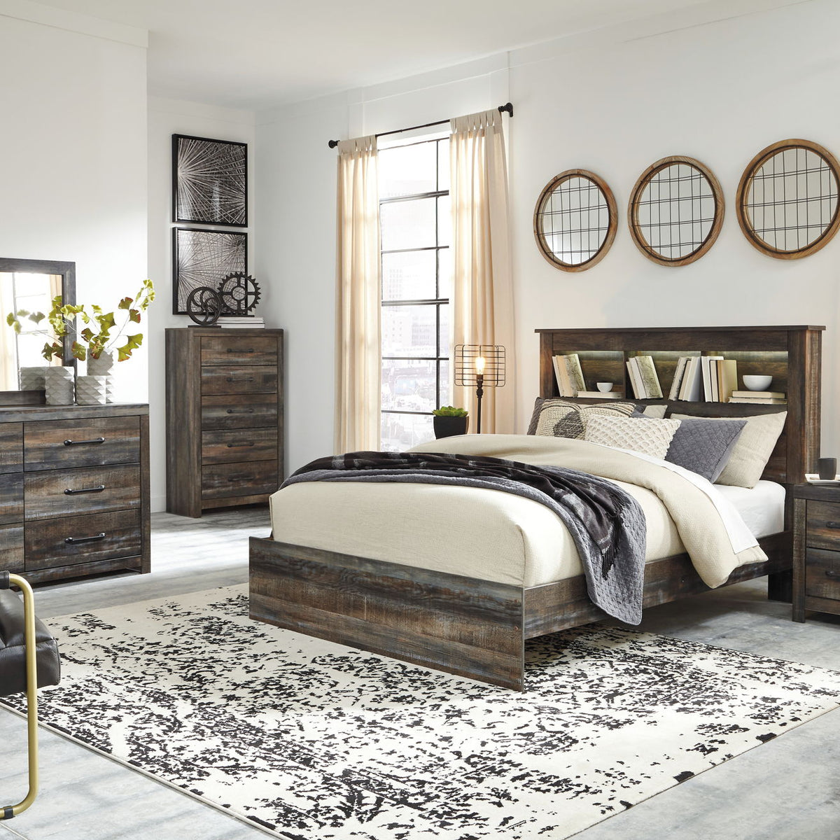 Panel bookcase bed with open-shelf headboard and side storage drawers, dark wood finish.