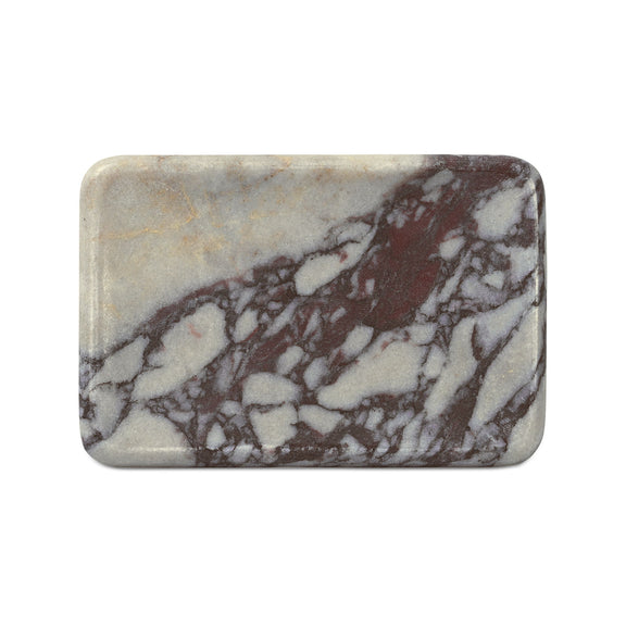 Rounded rectangular marble catchall with cream base and dark brown marble pattern
