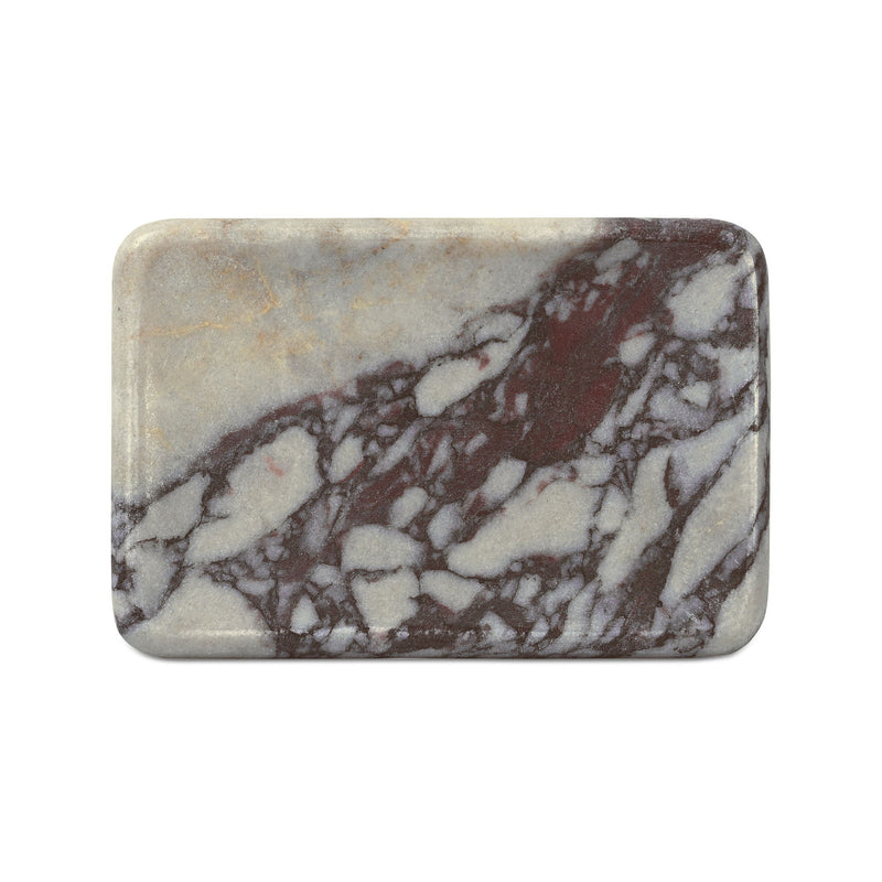 Rounded rectangular marble catchall with cream base and dark brown marble pattern