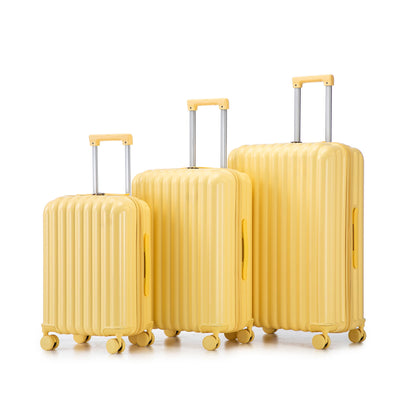 3-piece yellow ribbed hard-shell spinner luggage set with telescoping handles and wheels