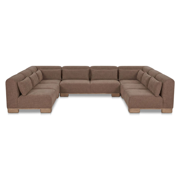 Dark brown U-shaped modular sectional sofa with tufted seat and padded armrests
