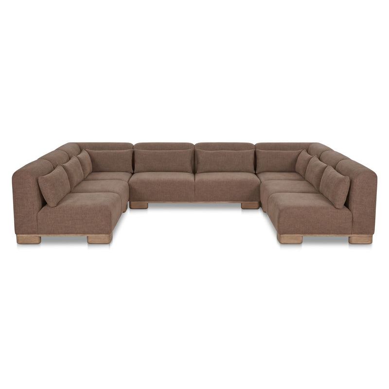 Dark brown U-shaped modular sectional sofa with tufted seat and padded armrests