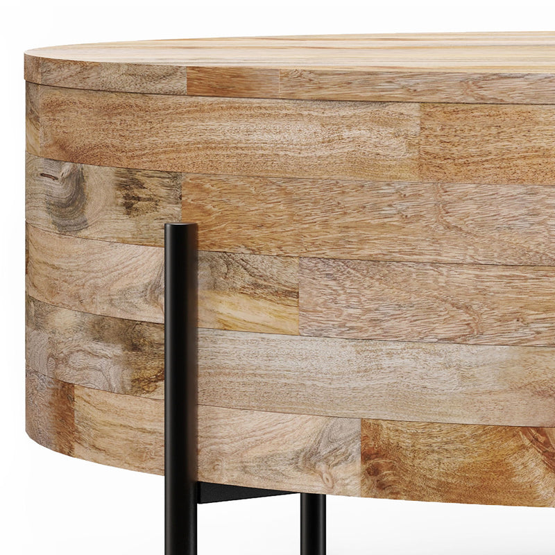 Close-up of the coffee table's natural wood panels and black metal leg