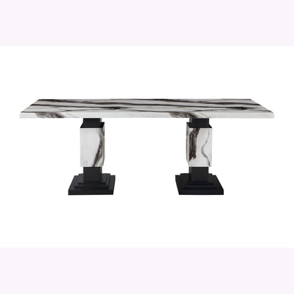 Dining table with marble-look top and black pedestal base legs