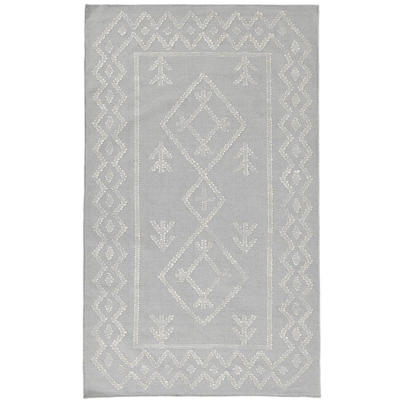 Gray rug with ornate lattice border and symmetrical diamond details throughout