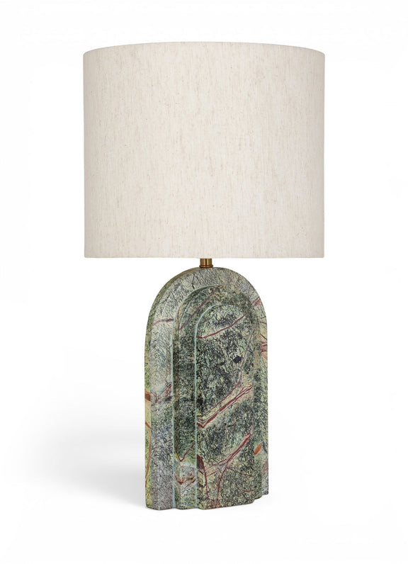 Table lamp with beige fabric shade and green multicolor textured stone base